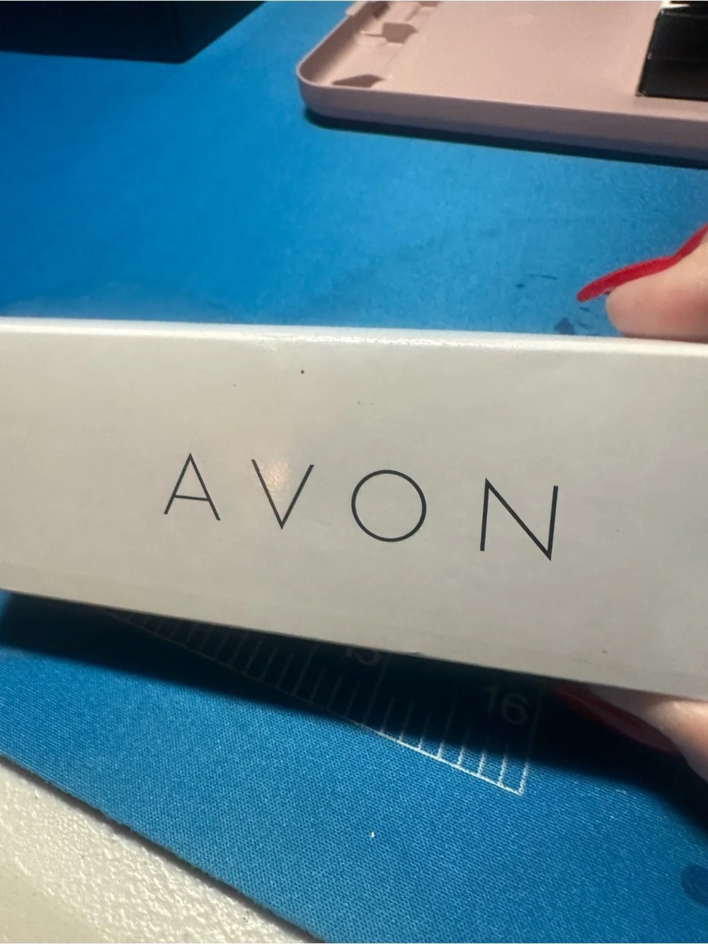 Avon Halloween band with glow in dark face numbers